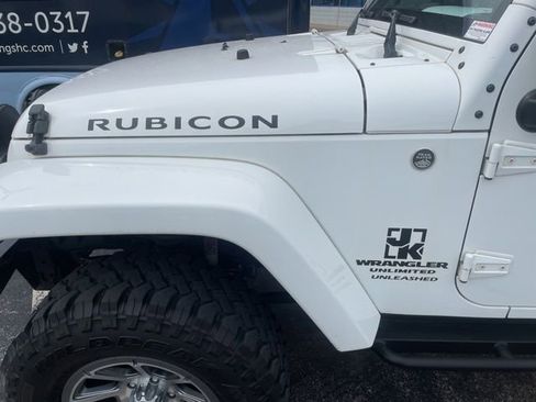 Used 2012 Jeep Wrangler Unlimited Rubicon w/ Dual Top Group AWD/4WD image 2