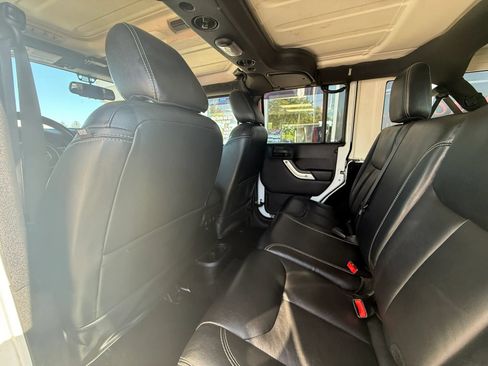 Used 2015 Jeep Wrangler Unlimited Sahara w/ Dual Top Group AWD/4WD image 11