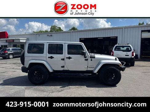 Used 2012 Jeep Wrangler Unlimited Sahara AWD/4WD image 1