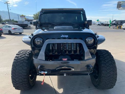 Used 2010 Jeep Wrangler Unlimited Rubicon w/ Dual Top Group image 14