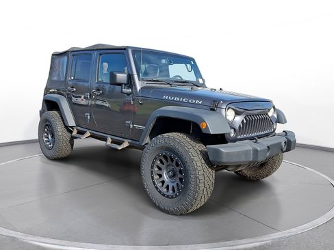 Used 2014 Jeep Wrangler Unlimited Rubicon w/ Connectivity Group AWD/4WD image 1