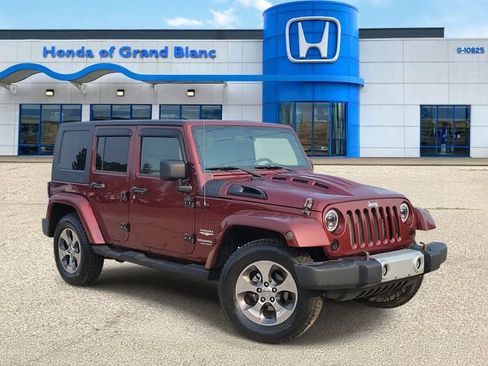 Used 2009 Jeep Wrangler Unlimited Sahara w/ Dual Top Group AWD/4WD image 1