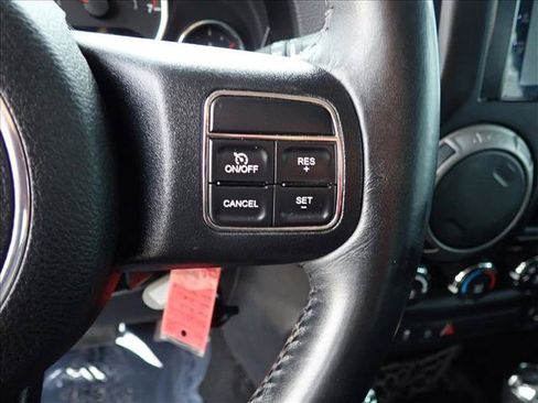 Used 2013 Jeep Wrangler Unlimited Sport w/ Mopar Black Appearance Group AWD/4WD image 14