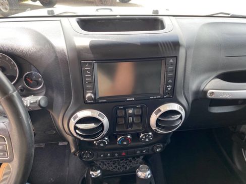 Used 2012 Jeep Wrangler Unlimited Sahara w/ Dual Top Group AWD/4WD image 26