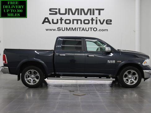 Used 2016 RAM 1500 Laramie w/ Convenience Group AWD/4WD image 1