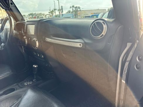 Used 2014 Jeep Wrangler Unlimited Sahara w/ Dual Top Group image 9