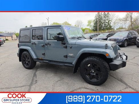 Used 2015 Jeep Wrangler Unlimited Sahara w/ Dual Top Group AWD/4WD image 1
