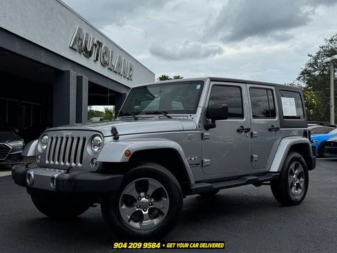 Used 2018 Jeep Wrangler Unlimited Sahara AWD/4WD image 1