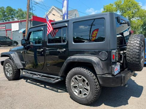 Used 2016 Jeep Wrangler Unlimited Rubicon w/ Dual Top Group AWD/4WD image 9