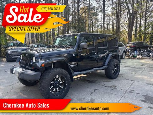 Used 2013 Jeep Wrangler Unlimited Sahara w/ Dual Top Group image 1