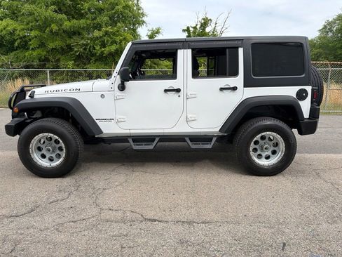 Used 2011 Jeep Wrangler Unlimited Rubicon w/ Dual Top Group AWD/4WD image 33