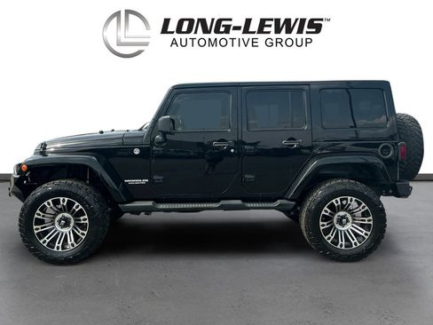 Used 2013 Jeep Wrangler Unlimited Sahara AWD/4WD image 2