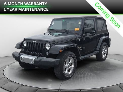 Used 2015 Jeep Wrangler Sahara image 1