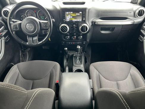 Used 2014 Jeep Wrangler Unlimited Sahara w/ Dual Top Group AWD/4WD image 14