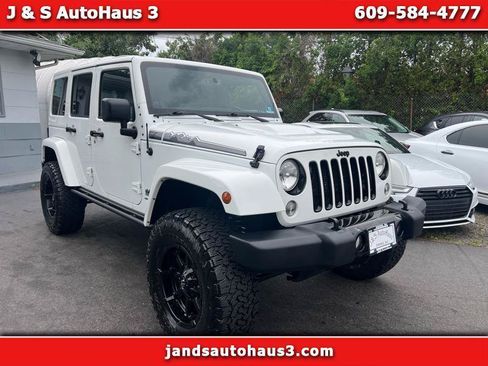 Used 2014 Jeep Wrangler Unlimited Sahara AWD/4WD image 1
