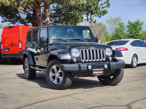 Used 2016 Jeep Wrangler Unlimited Sahara w/ Trailer Tow Group AWD/4WD image 1