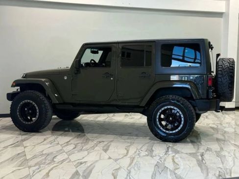Used 2015 Jeep Wrangler Unlimited Sahara w/ Max Tow Package AWD/4WD image 8