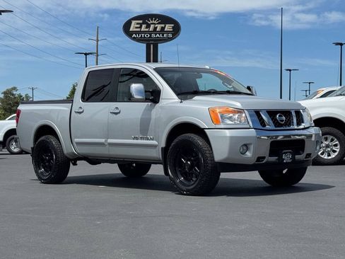 Used 2013 Nissan Titan SL AWD/4WD image 1