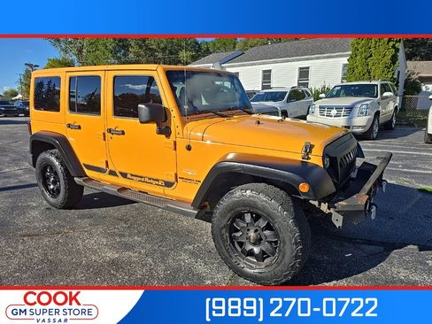 Used 2012 Jeep Wrangler Unlimited Sahara w/ Dual Top Group image 1