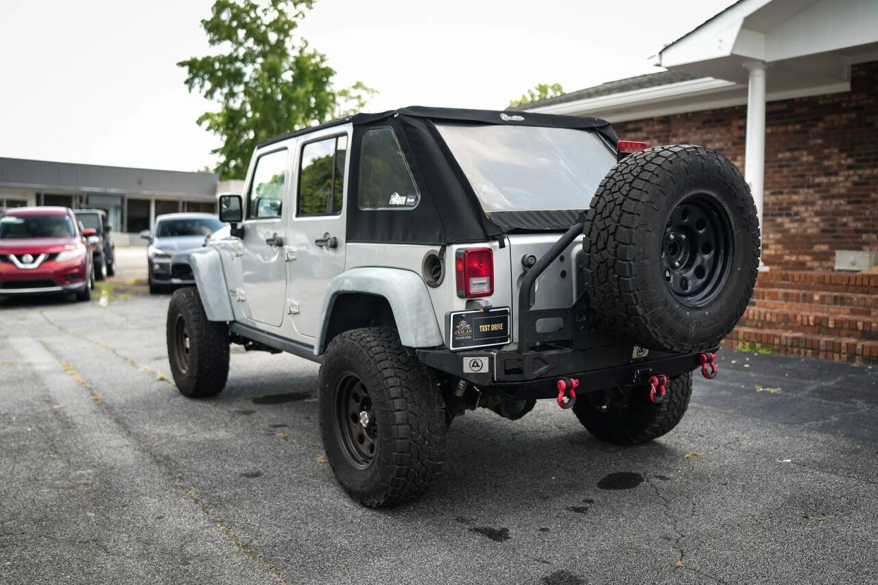 Used 2012 Jeep Wrangler Unlimited Rubicon w/ Dual Top Group AWD/4WD image 17