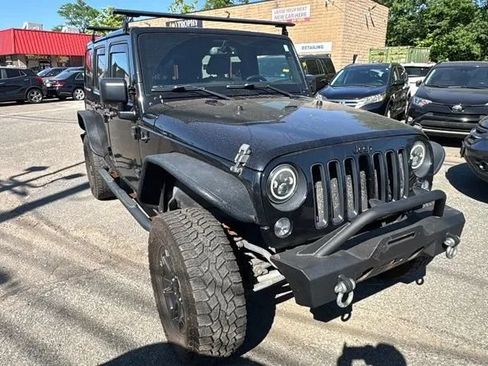 Used 2016 Jeep Wrangler Unlimited Sahara AWD/4WD image 1
