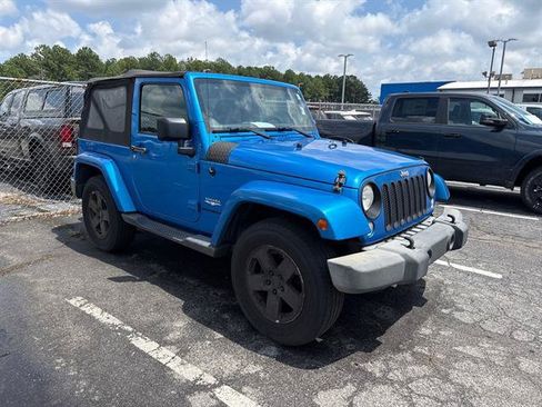 Used 2015 Jeep Wrangler Sahara AWD/4WD image 1