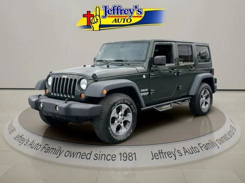 Used 2011 Jeep Wrangler Unlimited Sport AWD/4WD image 1