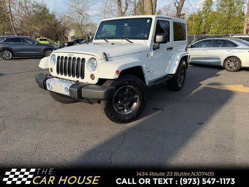 Used 2014 Jeep Wrangler Sahara w/ Dual Top Group image 1
