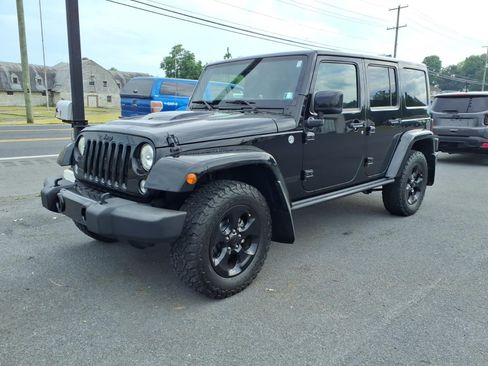 Used 2015 Jeep Wrangler Unlimited Sahara AWD/4WD image 1