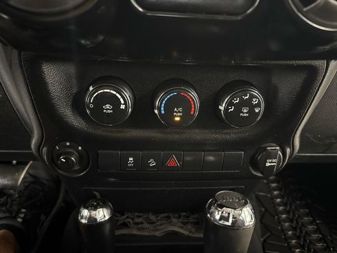 Used 2012 Jeep Wrangler Unlimited Sport AWD/4WD image 16