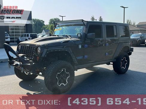 Used 2013 Jeep Wrangler Unlimited Rubicon w/ Dual Top Group AWD/4WD image 1