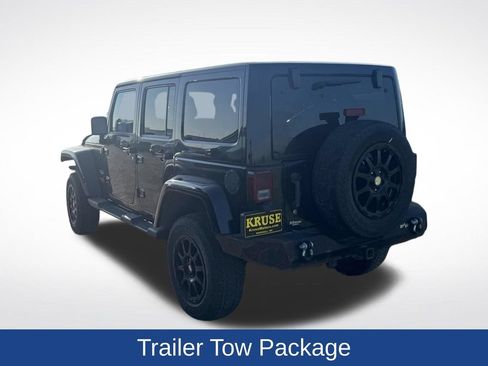 Used 2012 Jeep Wrangler Unlimited Sahara w/ Dual Top Group AWD/4WD image 12