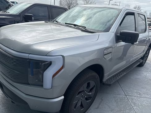 Used 2023 Ford F150 Lightning XLT w/ Equipment Group 312A High image 1