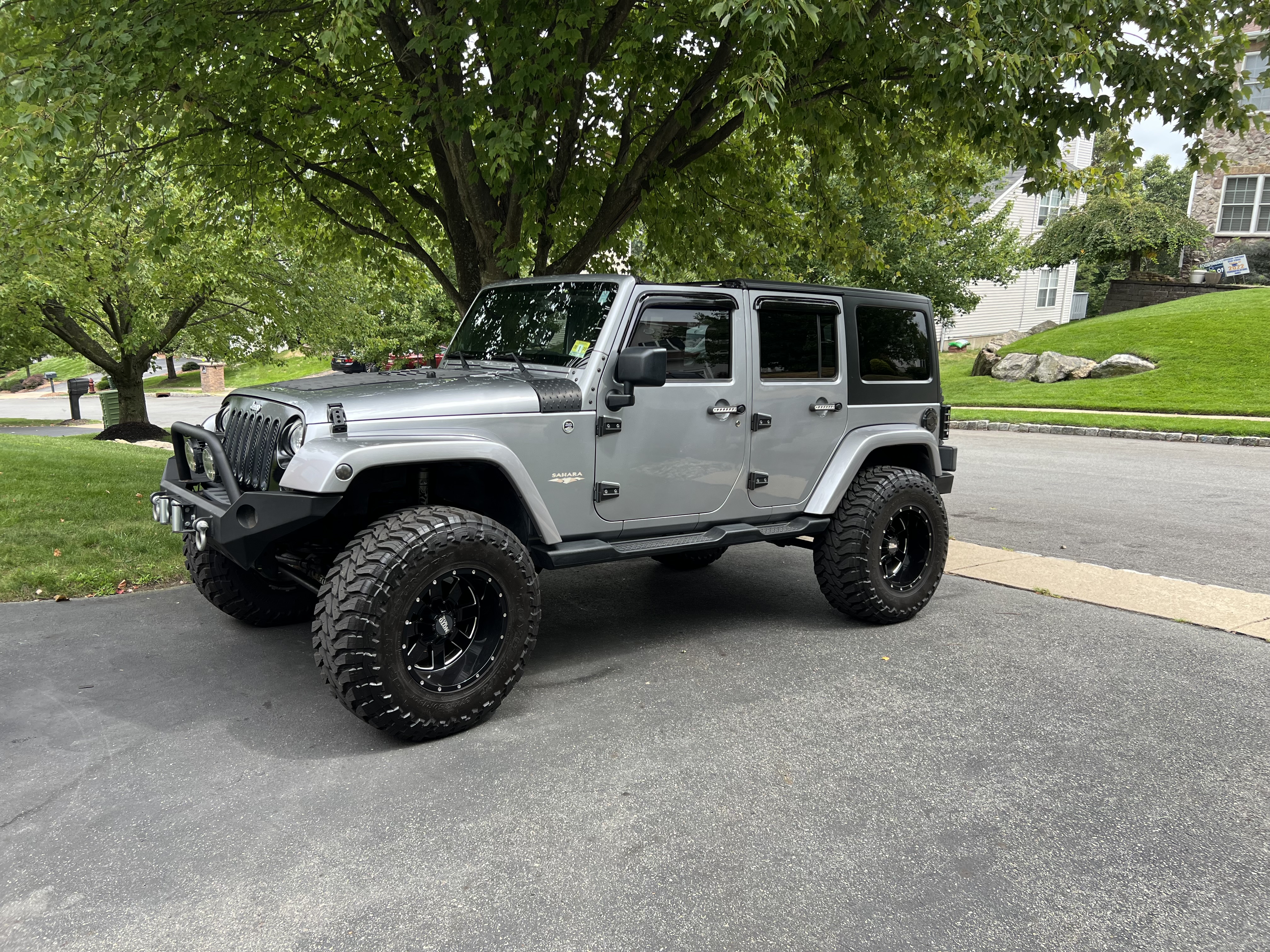 Used 2013 Jeep Wrangler Unlimited Sahara w/ Dual Top Group AWD/4WD image 1