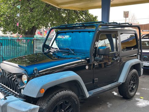 Used 2016 Jeep Wrangler Sport image 1