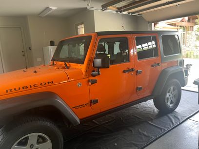 Used 2012 Jeep Wrangler Unlimited Rubicon w/ Dual Top Group