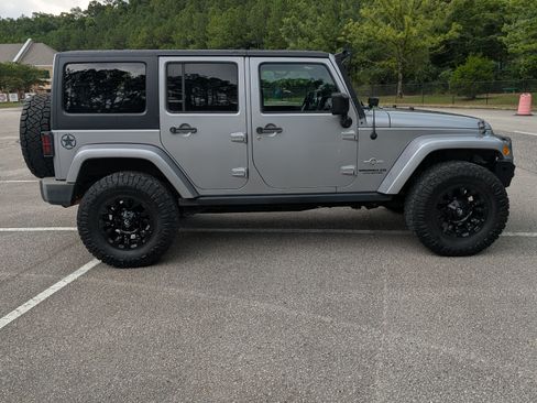 Used 2013 Jeep Wrangler Unlimited Sport AWD/4WD image 2