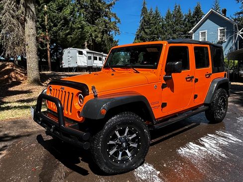 Used 2012 Jeep Wrangler Unlimited Sport w/ Connectivity Group AWD/4WD image 1