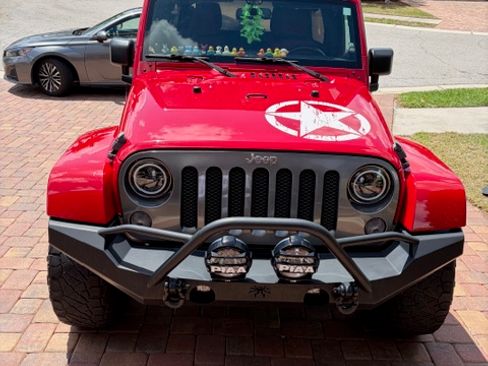 Used 2014 Jeep Wrangler Unlimited Sport image 1