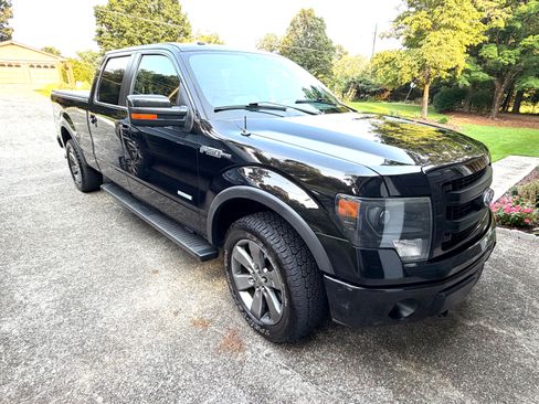 Used 2013 Ford F150 FX4 w/ Luxury Equipment Group AWD/4WD image 2