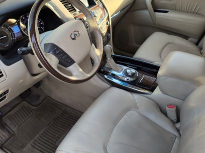 Used 2012 INFINITI QX56 4WD w/ Deluxe Touring Pkg