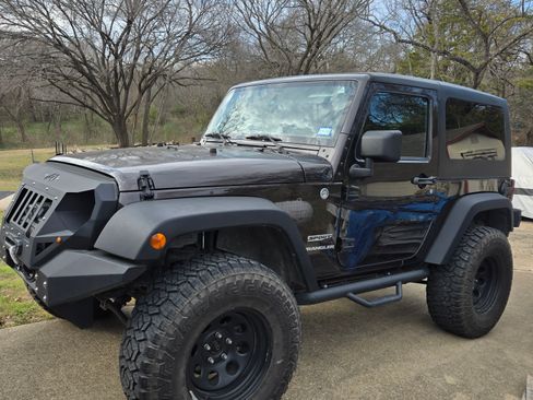 Used 2013 Jeep Wrangler Sport image 1