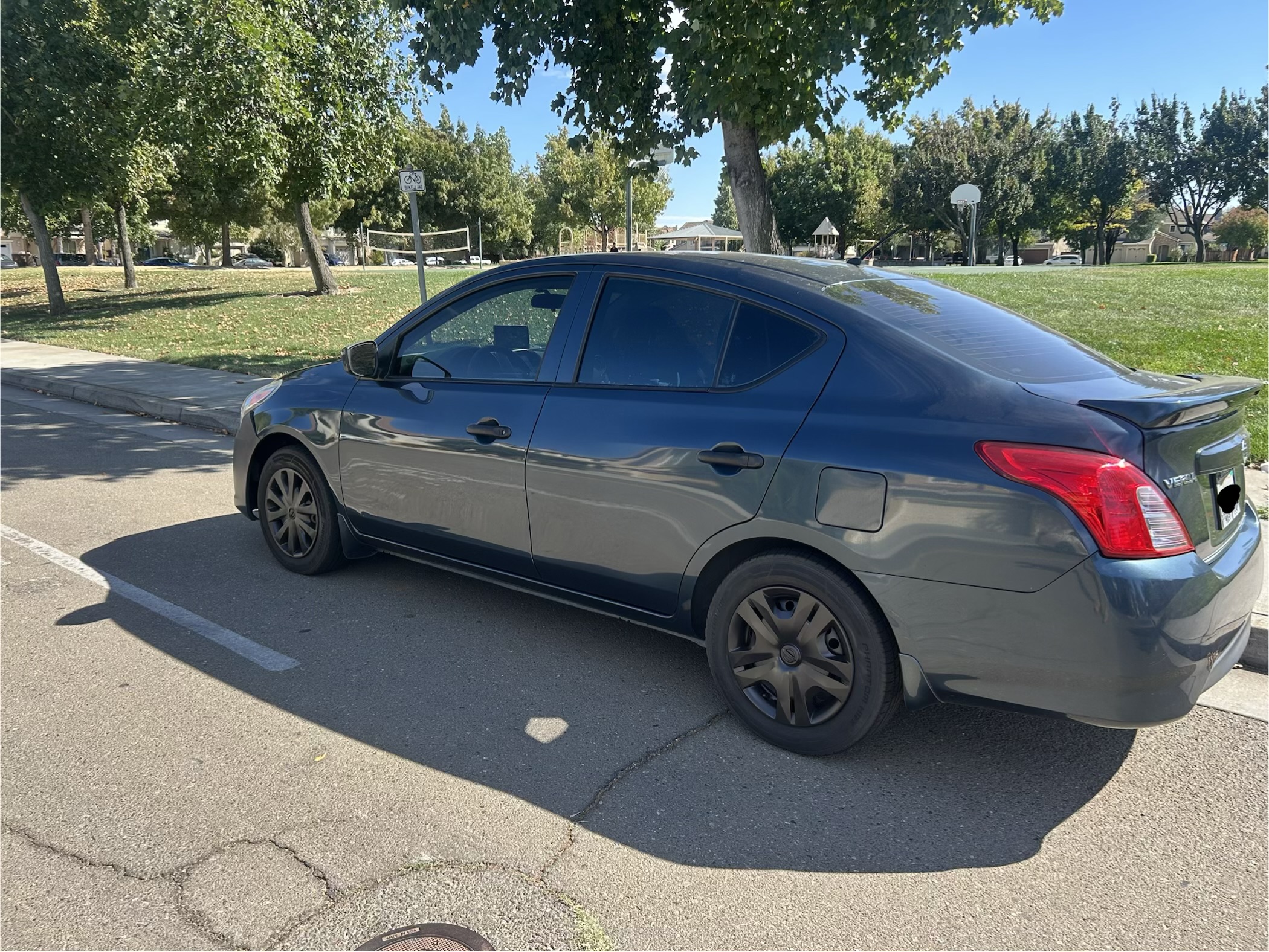 Used 2017 Nissan Versa S Plus FWD image 1