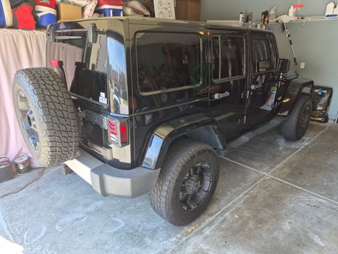 Used 2013 Jeep Wrangler Unlimited Sahara w/ Dual Top Group image 2