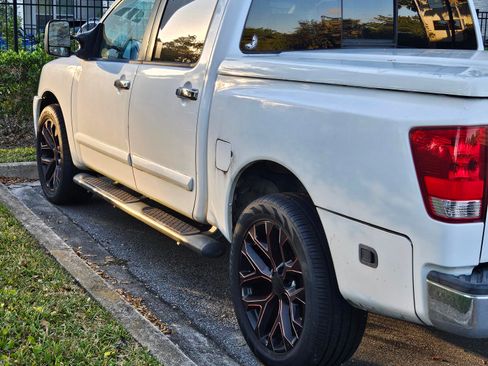 Used 2004 Nissan Titan LE w/ (NAV) Nissan Navigation Pkg image 1