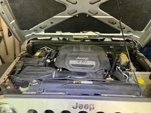 Used 2012 Jeep Wrangler Sport AWD/4WD image 1
