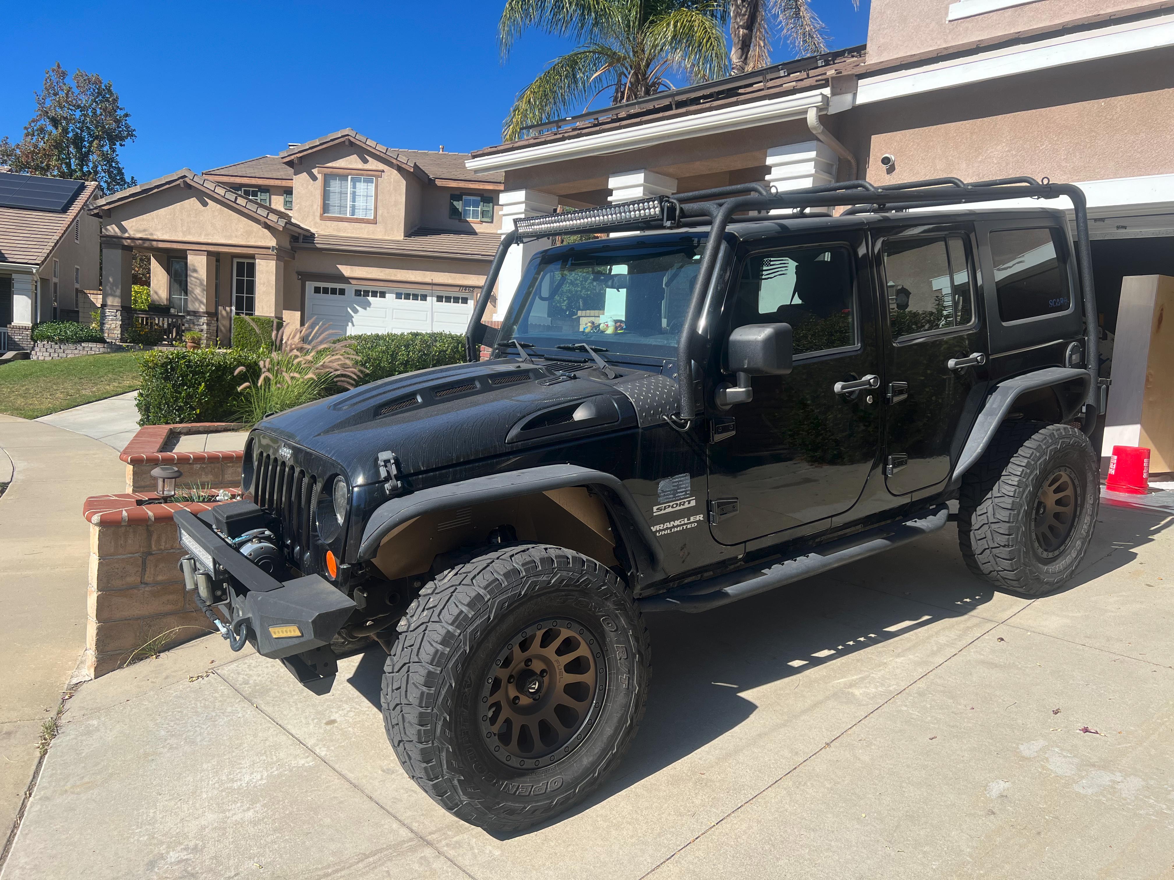 Used 2012 Jeep Wrangler Unlimited Sport AWD/4WD image 1