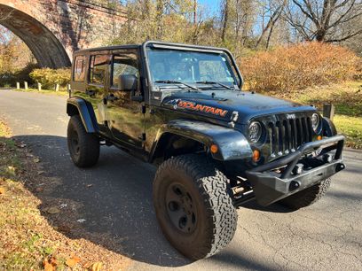Used 2010 Jeep Wrangler Unlimited Sahara w/ Dual Top Group