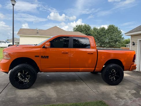 Used 2017 RAM 1500 Sport w/ Ignition Orange Sport Package AWD/4WD image 2