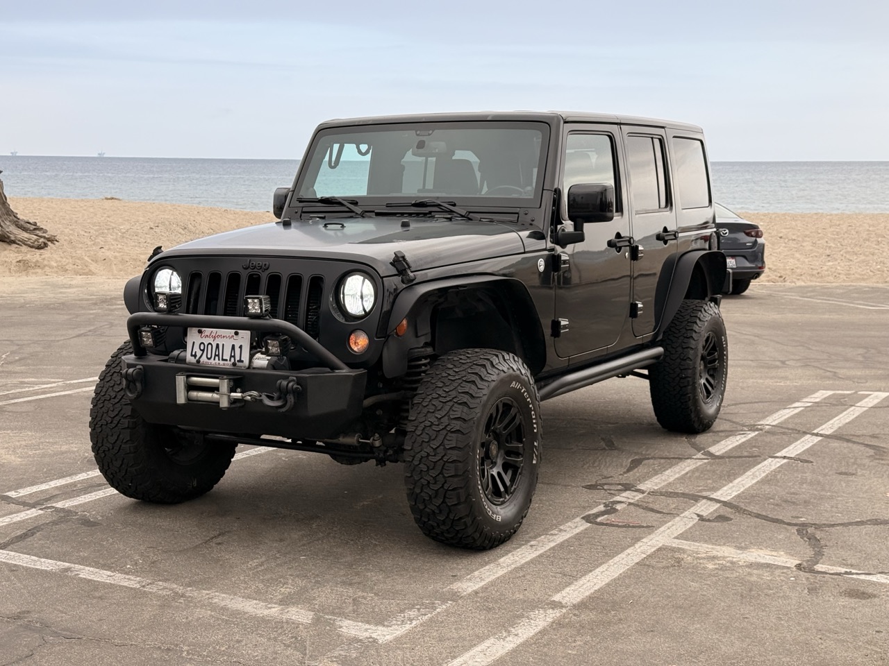Used 2014 Jeep Wrangler Unlimited Sahara AWD/4WD image 1